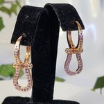Gold with Purple CZ Horseshoe Huggie Hoop Earrings Photo 1