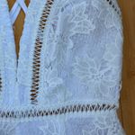 Revolve by the way. Rory Lace Romper in White Photo 8