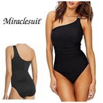 New. Black one shouldered one piece swimsuit. Size 10. Retails $164 Photo 1