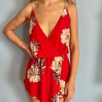 Reverse red floral romper  Photo 0