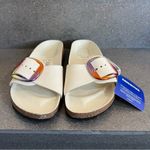 Birkenstock  Madrid Iridescent Big
Buckle Nubuck Leather Slide Sandal, Ecru,37EU Photo 13
