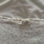 Brandy Melville John Galt  Tee Photo 3
