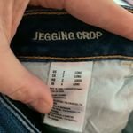 American Eagle  distressed dark wash 2 long jegging crop jeans Photo 1