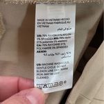 Chico's Women’s Chico’s tan colored front pocket flat pull on ankle pants Size 8 Photo 3