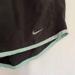 Nike shorts women's size XS black and green athletic pants casual lightweight Photo 1