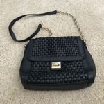 Forever 21 Cute woven style black purse with gold strap Photo 0