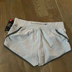 NWT under Armour running Women's Gray Shorts Size L Photo 1