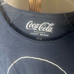 Lucky Brand x Coca-Cola Smiley Face Long Sleeve Shirt Womenโs Medium NWT Photo 2