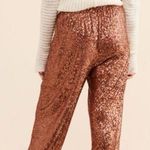 Free People Morelia Sequin Joggers in Copper Western Boho Medium Gently Used Photo 1