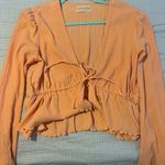 Urban Outfitters  ruffle long sleeve top Photo 1