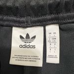 Adidas  unisex Black Joggers with White Stripes Photo 1