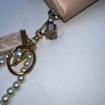 Ted Baker  Pink Faux Leather Zip Around Wallet with Pearl Charm Photo 2