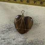 Handmade Pendant Wrapped In Gold Colored Wire Photo 0