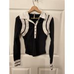 Free People  Wednesday Polo Jersey Top in Black Combo, S Photo 1