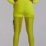adidas x IVY PARK and Peloton Capsule Neon Yellow Leggings Beyoncé Photo 0