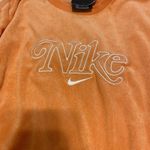 Nike vintage look sweater top. In color orange. Super cozy. Photo 1