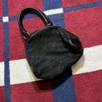 Fubu black monogram hand bag the collection
printed Photo 1