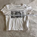 Hollister  Brooklyn NY Short Sleeve Baby Tee Women’s T-Shirt Sz XS EUC Photo 4