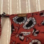 Free People  Some Like It Hot Long Sleeve V-Neck Jumpsuit in Rust Combo Photo 6