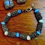 Premier Designs Like new vintage  silver cat eye bracelet and earrings. Photo 0