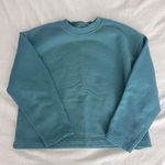 H&M teal crewneck Photo 2