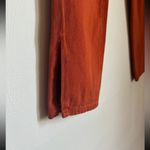 Pretty Little Thing Rust Split Hem High Rise Jeans 2 Photo 1