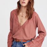 Free People  Parisian Night eyelet accent Vneck bell sleeve Top Color Sayluita 🆕 Photo 1