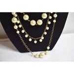 White House | Black Market  Triple Strand Pale Yellow Beaded Gold Tone Necklace Photo 1