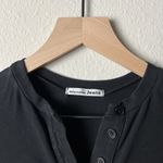 Reformation  nisa knit henley button long sleeve bodysuit in black Photo 4