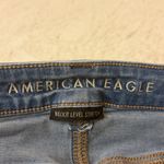 American Eagle - Super Hi-Rise Flare Jeans Large Front Thigh Pockets Size 8 SHORT Photo 2