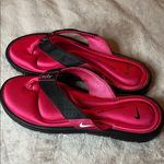 Nike Black and Pink Flip-Flops Photo 2