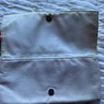 White/cream clutch cute for going out, put your hand through the ring for ease White Photo 2