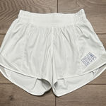 Lululemon  Hotty Hot Short‎ 4" White Running Shorts OVA Logo Size 2 Tall Photo 0