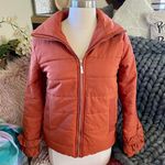 Boutique Rust Orange Puffer Photo 0