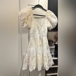 NWT Rubienn Eyelet Tired Back Tie Frill Mini Dress In Off White Photo 6
