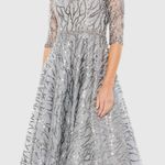 Mac Duggal  -  Silver High Neck Above Elbow Sleeve Embellished A Line Dress Photo 0