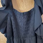 Boutique  Black Flowy Romper Photo 1