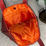 Vibrant Red Tote Bag with Glossy Finish Photo 5