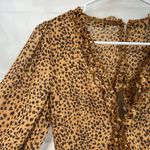 Women's brown leopard print ruffle deep v Photo 2