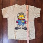 GARFIELD PAWS graphic print tee shirt, unisex, size M Yellow Size M Photo 4