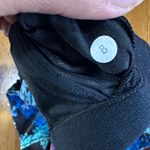 Lululemon  athletica Black and Blue Floral SPORT Top Photo 6