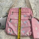 My Green Shoulder and Wristlet Purse size in photos brand new color light pink Photo 1