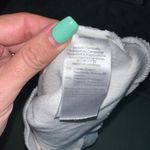 Madewell  Elwood Knot Front Top
Medium, BRIGHT IVORY
Item #5769410 Photo 3