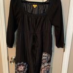 Lulumari  drawstring empire waist dress with embroidered floral appliqués. Photo 2