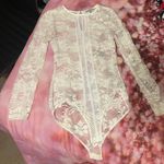Charlotte Russe Lace Long Sleeve Bodysuit Photo 0