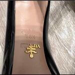 Prada  peptoe Patent Leather Pumps are a size 8. Photo 4