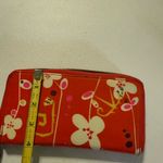 Pylones large "Voyage" wallet with a white flower/orchid pattern red Background Photo 2