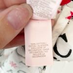 Victoria's Secret White, Black, and Red Snowflake Flannel Pajama Shirt Photo 3