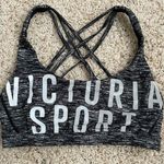 Victoria's Secret women’s grey and white strappy victoria’s secret / victoria sport sports bra! Photo 0