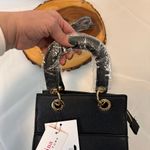 Trina Turk Black Mini Bag with Double Handles Crossbody Strap front slip pocket Photo 11